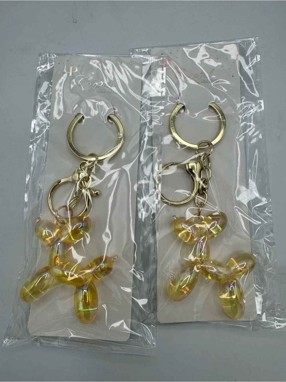 (1) Iridescent Yellow Balloon Dog Keychain - Gold Hardware